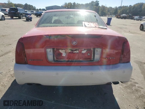 2002 Cadillac DeVille DTS with VIN 1G6KF57942U231877, listed as a Copart auction lot 76724554 with 180,082 mi miles and Salvage Title. Bid and sale history available at carsss.com. Image 6.