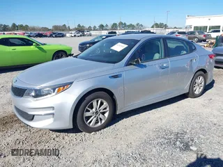 2016 Kia Optima LX with VIN 5XXGT4L37GG015462, listed as a IAAI auction lot 41247091 with 165,755 mi miles and . Bid and sale history available at DreamBid. Image 2.