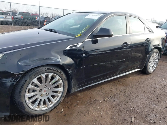 2011 Cadillac CTS Premium with VIN 1G6DS5ED7B0101210, listed as a IAAI auction lot 41802027 with 127,701 mi miles. Bid and sale history available at carsss.com. Image 6.
