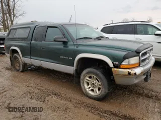 1999 Dodge Dakota SLT with VIN 1B7GG22X4XS309050, listed as a Copart auction lot 82030864 with 141,396 mi miles and Non Repairable. Bid and sale history available at DreamBid. Image 4.