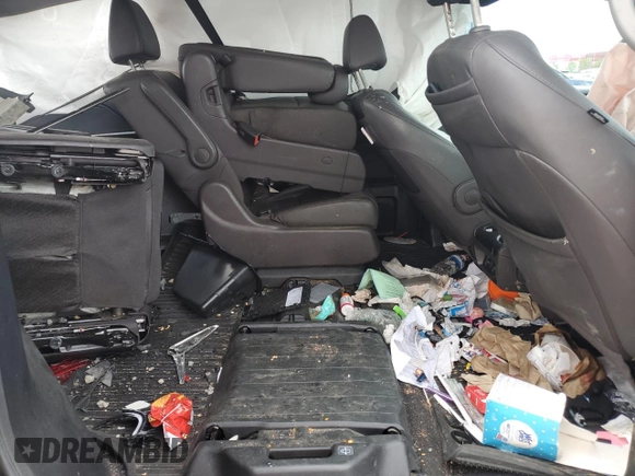 2019 Honda Odyssey EX-L z VIN 5FNRL6H79KB133976, wystawiony jako Copart lot #56988215 z przebiegiem Nie podano mil oraz Szkoda całkowita • Salvage title. Historia ofert i sprzedaży dostępna na DreamBid. Obrazek 11.