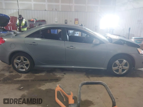 2009 Pontiac G6 1SB with VIN 1G2ZJ57B894237824, listed as a IAAI auction lot 41731113 with 144,914 mi miles and . Bid and sale history available at DreamBid. Image 13.