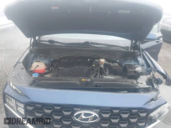 2022 Hyundai Santa Fe SE z VIN 5NMS14AJ8NH406846, wystawiony jako IAAI lot #41588202 z przebiegiem 34 006 mil mil oraz . Historia ofert i sprzedaży dostępna na DreamBid. Obrazek 10.