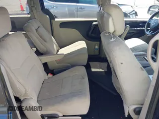 2012 Dodge Grand Caravan SXT with VIN 2C4RDGCGXCR277505, listed as a IAAI auction lot 42194492 with 206,565 mi miles and . Bid and sale history available at DreamBid. Image 8.
