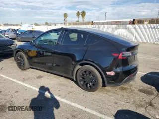2024 Tesla Model Y Long Range z VIN 7SAYGAEE2RF075681, wystawiony jako Copart lot #86433524 z przebiegiem 18 640 mil mil oraz Szkoda całkowita • Salvage title. Historia ofert i sprzedaży dostępna na DreamBid. Obrazek 2.