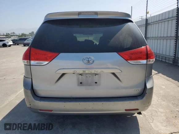 2012 Toyota Sienna LE AAS with VIN 5TDKK3DC2CS207404, listed as a Copart auction lot 62781215 with 200,757 mi miles and Salvage title. Bid and sale history available at DreamBid. Image 6.