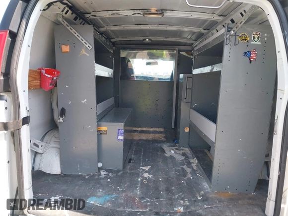2013 Chevrolet Express Cargo with VIN 1GCWGFCB8D1902532, listed as a IAAI auction lot 42452764 with 95,113 mi miles and . Bid and sale history available at DreamBid. Image 8.