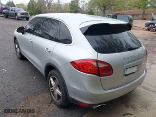 2012 Porsche Cayenne S Hybrid with VIN WP1AE2A2XCLA90082, listed as a IAAI auction lot 41960714 with 139,081 mi miles. Bid and sale history available at carsss.com. Image 3.