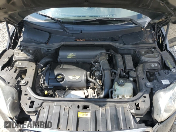 2014 MINI Countryman S with VIN WMWZC3C57EWP25099, listed as a Copart auction lot 62646555 with 153,059 mi miles and Salvage title. Bid and sale history available at DreamBid. Image 11.