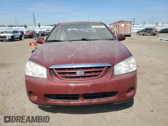 2005 Kia Spectra LX z VIN KNAFE121355162932, wystawiony jako Copart lot #56292625 z przebiegiem 92 828 mil mil oraz Szkoda całkowita • Salvage title. Historia ofert i sprzedaży dostępna na DreamBid. Obrazek 5.