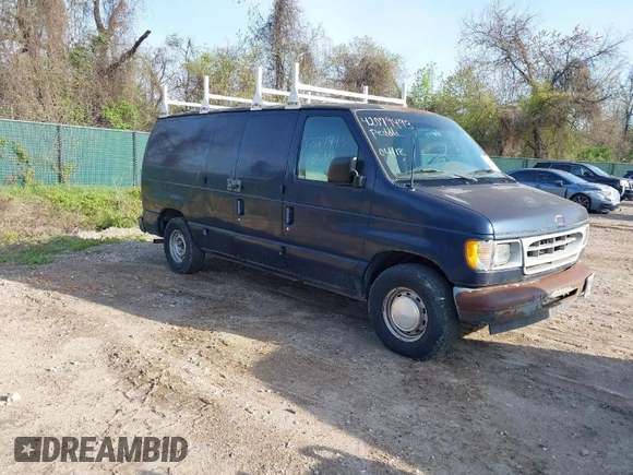 2002 Ford Econoline Cargo with VIN 1FTRE142X2HA67221, listed as a IAAI auction lot 42079493 with 180,324 mi miles. Bid and sale history available at carsss.com. Image 1.