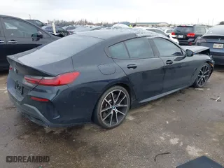 2021 BMW 8 Series M850i with VIN WBAGV8C03MCG68700, listed as a IAAI auction lot 41684696 with 18,516 mi miles. Bid and sale history available at carsss.com. Image 4.