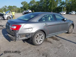 2011 Ford Taurus Limited with VIN 1FAHP2FW3BG117688, listed as a IAAI auction lot 41974469 with 215,036 mi miles and . Bid and sale history available at carsss.com. Image 4.