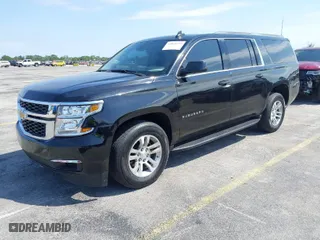 2018 Chevrolet Suburban LT with VIN 1GNSCHKC7JR111560, listed as a IAAI auction lot 41823175 with 136,751 mi miles. Bid and sale history available at carsss.com. Image 2.