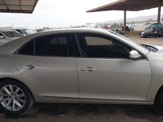2015 Chevrolet Malibu LTZ with VIN 1G11F5SL6FF166335, listed as a IAAI auction lot 41578042 with 171,359 mi miles. Bid and sale history available at carsss.com. Image 13.
