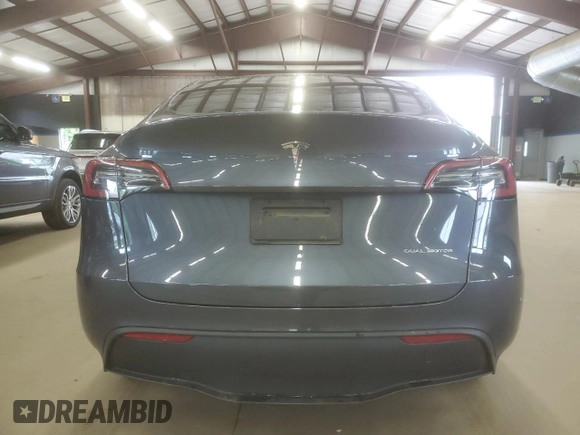 2023 Tesla Model Y Long Range z VIN 7SAYGDEE6PA179733, wystawiony jako Copart lot #58399015 z przebiegiem 45 780 mil mil oraz Szkoda całkowita • Salvage title. Historia ofert i sprzedaży dostępna na DreamBid. Obrazek 6.
