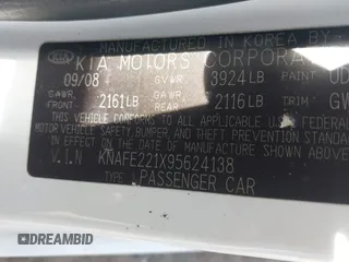 2009 Kia Spectra EX with VIN KNAFE221X95624138, listed as a IAAI auction lot 41823611 with 136,790 mi miles. Bid and sale history available at carsss.com. Image 9.