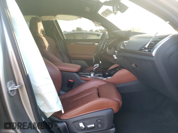 2021 BMW X4 M z VIN 5YMUJ0C00M9F77102, wystawiony jako Copart lot #59472373 z przebiegiem 5 041 mil mil oraz . Historia ofert i sprzedaży dostępna na DreamBid. Obrazek 5.