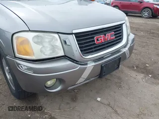 2005 GMC Envoy SLT with VIN 1GKDT13S352129944, listed as a IAAI auction lot 41527180 with 188,541 mi miles. Bid and sale history available at carsss.com. Image 12.
