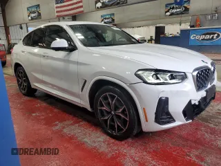 2023 BMW X4 xDrive30i with VIN 5UX33DT07P9P12954, listed as a Copart auction lot 42596275 with 27,590 mi miles and Salvage Title. Bid and sale history available at carsss.com. Image 4.