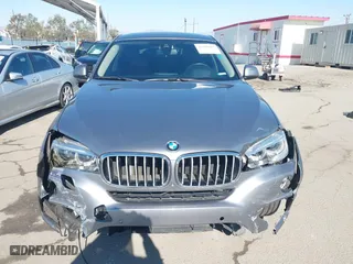 2015 BMW X6 xDrive50i with VIN 5UXKU6C52F0F94060, listed as a IAAI auction lot 41299202 with 67,835 mi miles. Bid and sale history available at carsss.com. Image 12.