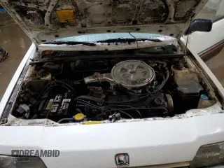 1986 Honda Civic z VIN JHMAF5314GS037036, wystawiony jako Copart lot #44577705 z przebiegiem 286 229 mil mil oraz Tytuł czysty. Historia ofert i sprzedaży dostępna na DreamBid. Obrazek 11.