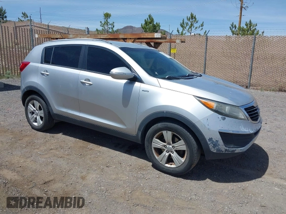 2011 Kia Sportage LX z VIN KNDPBCA20B7017756, wystawiony jako IAAI lot #42272296 z przebiegiem 205 630 mil mil oraz . Historia ofert i sprzedaży dostępna na DreamBid. Obrazek 1.