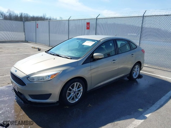 2016 Ford Focus SE with VIN 1FADP3F20GL329724, listed as a IAAI auction lot 41665265 with 131,000 mi miles. Bid and sale history available at carsss.com. Image 2.