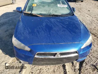 2009 Mitsubishi Lancer ES with VIN JA3AU26UX9U022011, listed as a Copart auction lot 74943964 with 129,312 mi miles and Salvage Title. Bid and sale history available at DreamBid. Image 12.