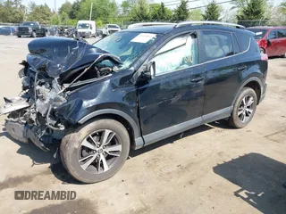 2018 Toyota RAV4 XLE with VIN 2T3WFREVXJW484872, listed as a IAAI auction lot 42144810 with Not provided miles and . Bid and sale history available at DreamBid. Image 18.