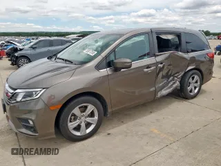 2018 Honda Odyssey EX z VIN 5FNRL6H56JB069666, wystawiony jako Copart lot #55817245 z przebiegiem 109 824 mil mil oraz Szkoda całkowita • Salvage title. Historia ofert i sprzedaży dostępna na DreamBid. Obrazek 1.