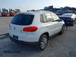 2013 Volkswagen Tiguan SE with VIN WVGAV7AX5DW545202, listed as a IAAI auction lot 42318584 with 91,556 mi miles and . Bid and sale history available at DreamBid. Image 4.