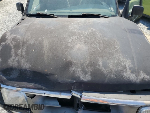 1997 Ford Ranger XL z VIN 1FTCR10U2VUA82888, wystawiony jako Copart lot #53454185 z przebiegiem 238 100 mil mil oraz Szkoda całkowita • Salvage title. Historia ofert i sprzedaży dostępna na DreamBid. Obrazek 11.