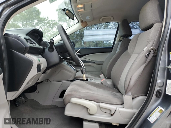 2014 Honda CR-V LX z VIN 3CZRM3H36EG706785, wystawiony jako Copart lot #50647425 z przebiegiem 101 497 mil mil oraz Czysty tytuł • Clean title. Historia ofert i sprzedaży dostępna na DreamBid. Obrazek 7.