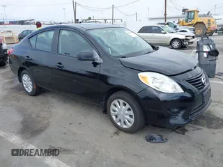 2012 Nissan Versa S with VIN 3N1CN7AP0CL941557, listed as a IAAI auction lot 42031640 with 74,276 mi miles and . Bid and sale history available at DreamBid. Image 1.
