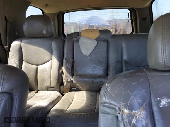 2003 GMC Yukon SLT z VIN 1GKEC13T53J319647, wystawiony jako Copart lot #49014225 z przebiegiem 298 601 mil mil oraz Czysty tytuł • Clean title. Historia ofert i sprzedaży dostępna na DreamBid. Obrazek 10.