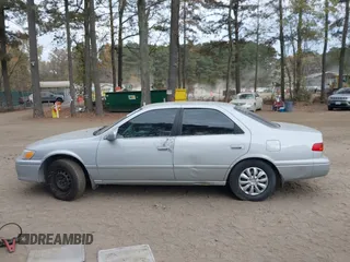 2000 Toyota Camry CE with VIN 4T1BG22K3YU715773, listed as a IAAI auction lot 40790259 with 202,717 mi miles and . Bid and sale history available at carsss.com. Image 14.