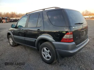 1999 Mercedes-Benz M-Class with VIN 4JGAB54E3XA092934, listed as a Copart auction lot 80631164 with 180,734 mi miles and Salvage Title. Bid and sale history available at carsss.com. Image 2.