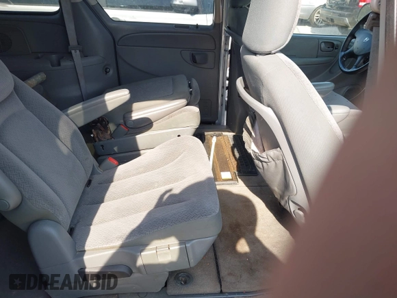 2005 Dodge Caravan SXT with VIN 2D4GP44L25R585797, listed as a IAAI auction lot 42025550 with 232,161 mi miles. Bid and sale history available at carsss.com. Image 8.