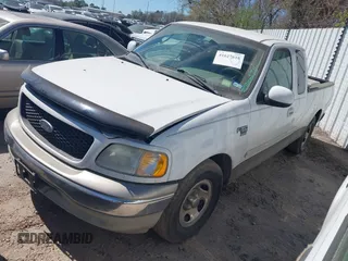 2003 Ford F-150 XL with VIN 1FTRX17W33NB65471, listed as a IAAI auction lot 41627618 with 1 mi miles. Bid and sale history available at carsss.com. Image 2.