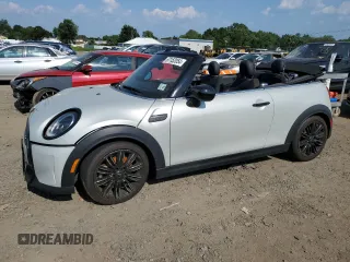 2022 MINI Convertible Cooper S z VIN WMW43DL08N3N99681, wystawiony jako Copart lot #67152054 z przebiegiem Nie podano mil oraz Szkody całkowita. Historia ofert i sprzedaży dostępna na DreamBid. Obrazek 1.