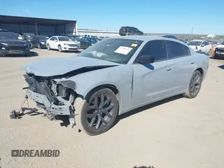 2022 Dodge Charger SXT with VIN 2C3CDXBG7NH208839, listed as a IAAI auction lot 41701171 with 71,552 mi miles and . Bid and sale history available at DreamBid. Image 18.