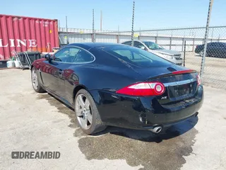 2009 Jaguar XK with VIN SAJWA43B295B31026, listed as a IAAI auction lot 41950751 with 110,331 mi miles. Bid and sale history available at carsss.com. Image 3.