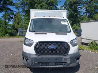 2021 Ford Transit with VIN 1FDBF6Z82MKA96495, listed as a IAAI auction lot 42410967 with 58,254 mi miles and . Bid and sale history available at DreamBid. Image 12.