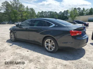 2014 Chevrolet Impala LT with VIN 2G1115SL1E9291216, listed as a Copart auction lot 56163445 with 215,747 mi miles and Salvage title. Bid and sale history available at DreamBid. Image 2.
