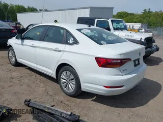 2019 Volkswagen Jetta S z VIN 3VWC57BU7KM243356, wystawiony jako IAAI lot #42334838 z przebiegiem 48 343 mil mil oraz . Historia ofert i sprzedaży dostępna na DreamBid. Obrazek 3.