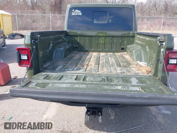 2023 Jeep Gladiator Rubicon with VIN 1C6JJTBGXPL586154, listed as a IAAI auction lot 41370352 with 11,207 mi miles and . Bid and sale history available at DreamBid. Image 8.