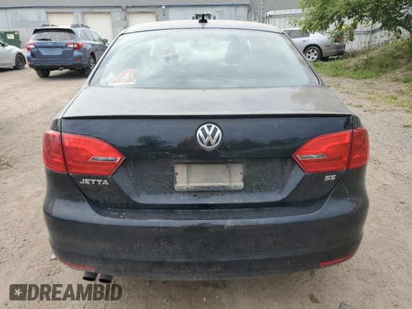 2014 Volkswagen Jetta SE z VIN 3VWD07AJ7EM220416, wystawiony jako Copart lot #60397265 z przebiegiem 184 854 mil mil oraz Czysty tytuł • Clean title. Historia ofert i sprzedaży dostępna na DreamBid. Obrazek 6.