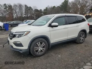 2017 Honda Pilot EX-L with VIN 5FNYF5H57HB022220, listed as a Copart auction lot 85722344 with 123,566 mi miles and Salvage Title. Bid and sale history available at carsss.com. Image 1.