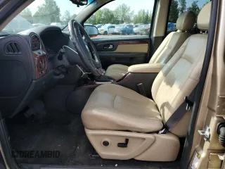 2005 GMC Envoy SLT with VIN 1GKDS13S552135280, listed as a Copart auction lot 68097344 with 165,924 mi miles and Salvage Title. Bid and sale history available at carsss.com. Image 7.